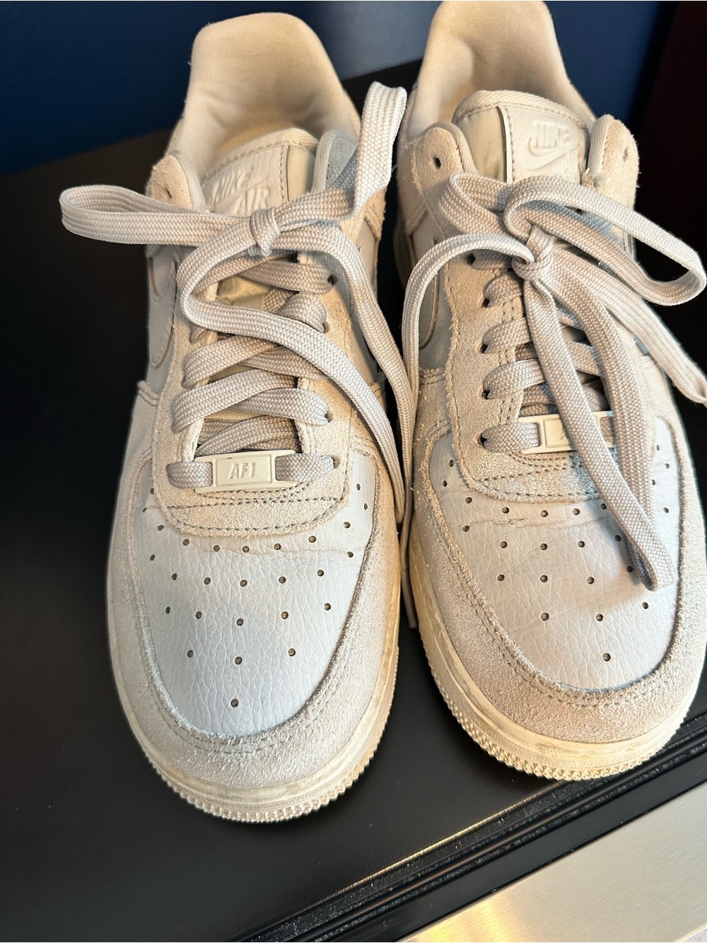 Nike Air Force One Women's Low-Top Sneakers in white and silver